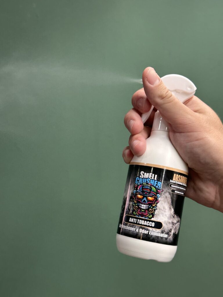 Smell Crusher Absorber Spray Anti Tobacco odor eliminator spray being sprayed