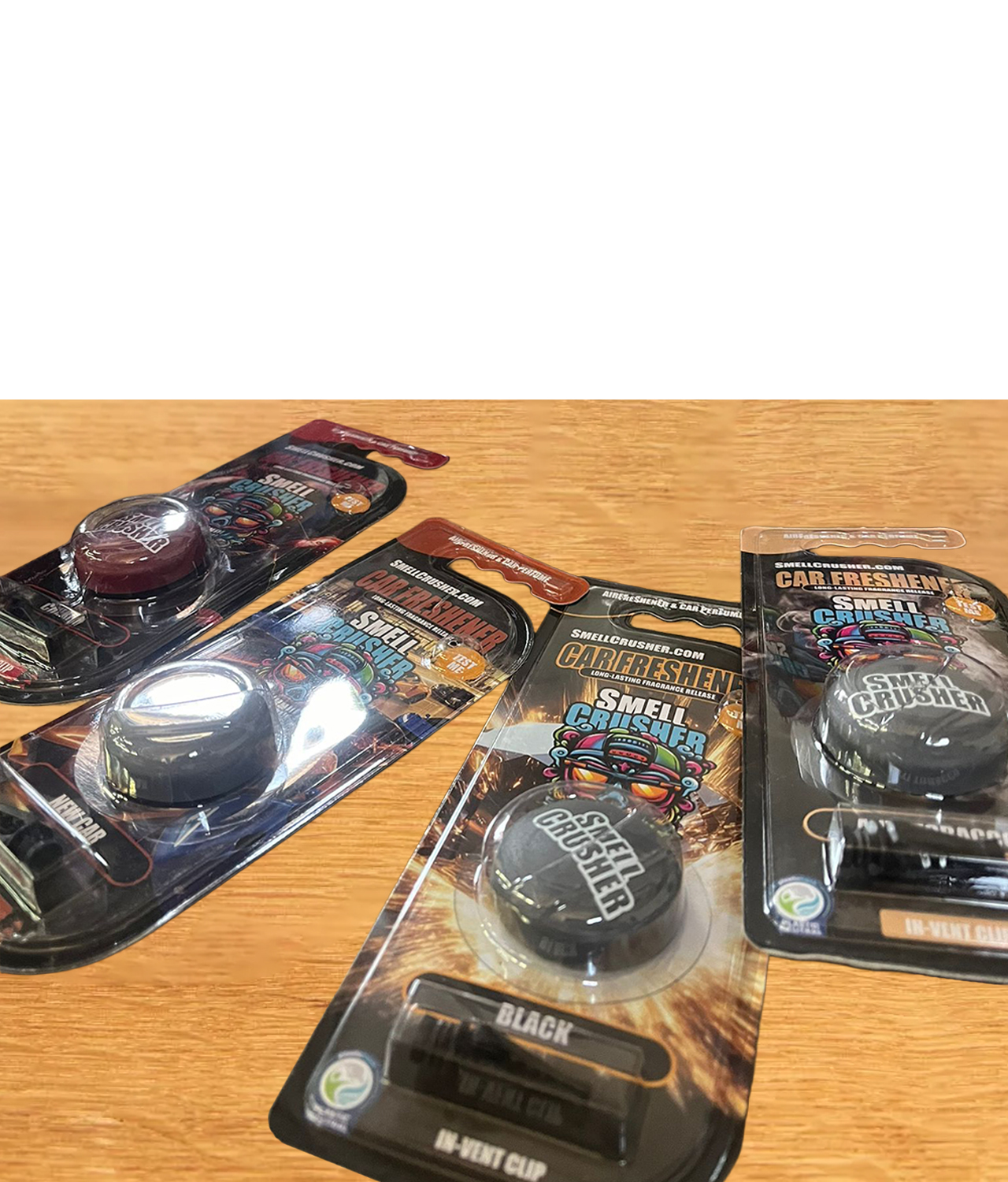 Smell Crusher car freshener range: Black, Cherry, New Car and Anti Tobacco vent clips