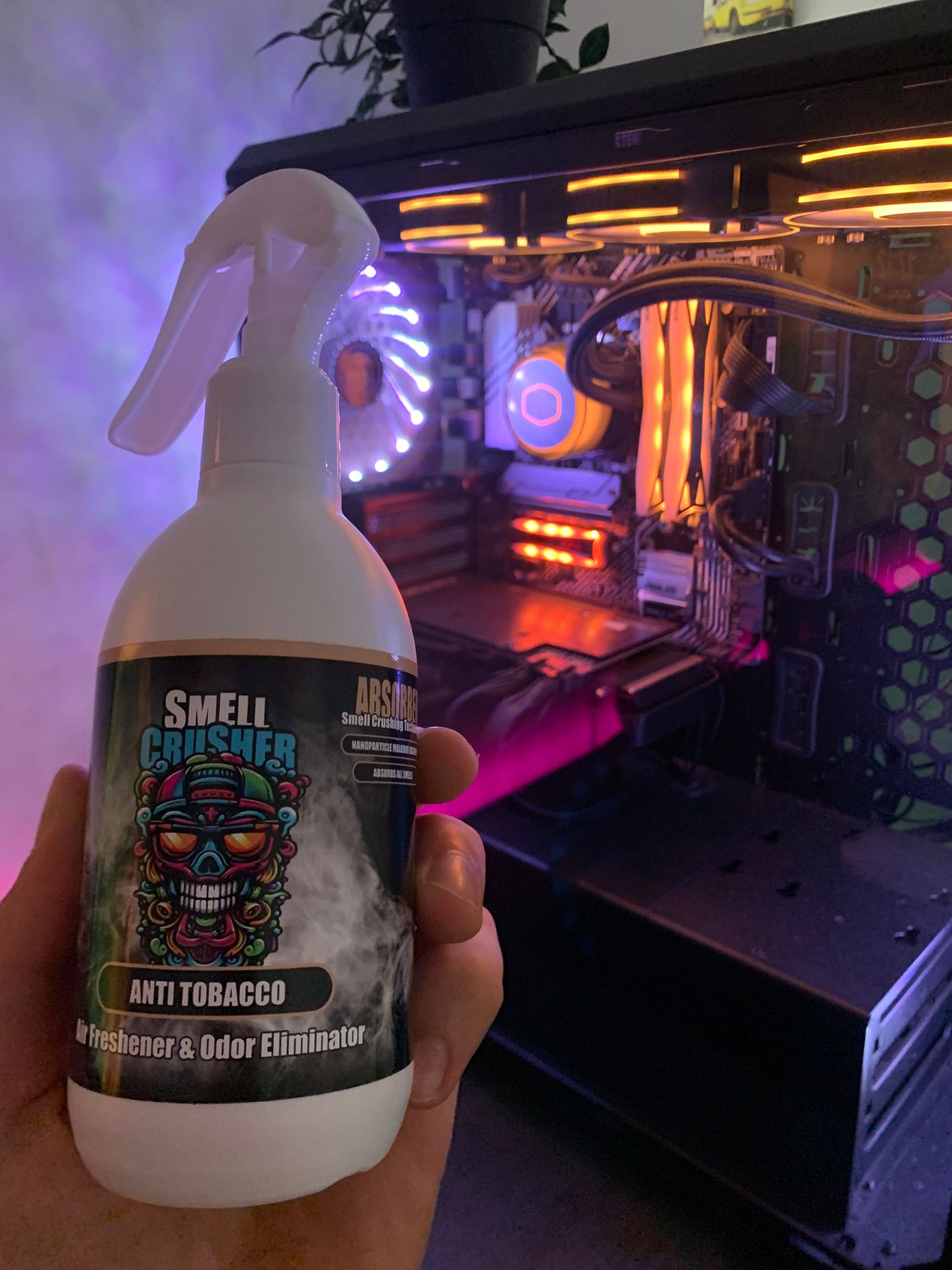 Smell Crusher Anti Tobacco Absorber Spray odor eliminator in front of a gaming PC