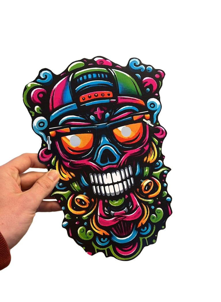 Smell Crusher skull mask with the colourful graffiti skull artwork, held in hand